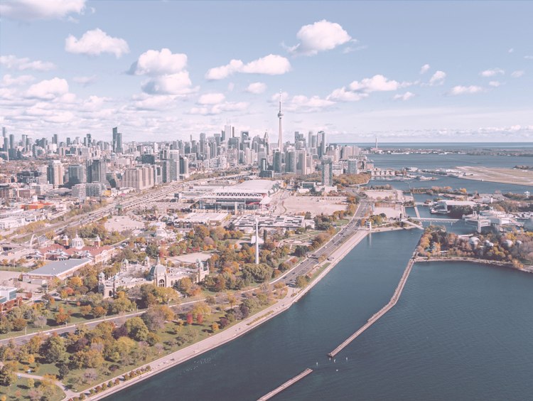 Aerial view of the Toronto skyline and waterfront across the Greater Toronto Area